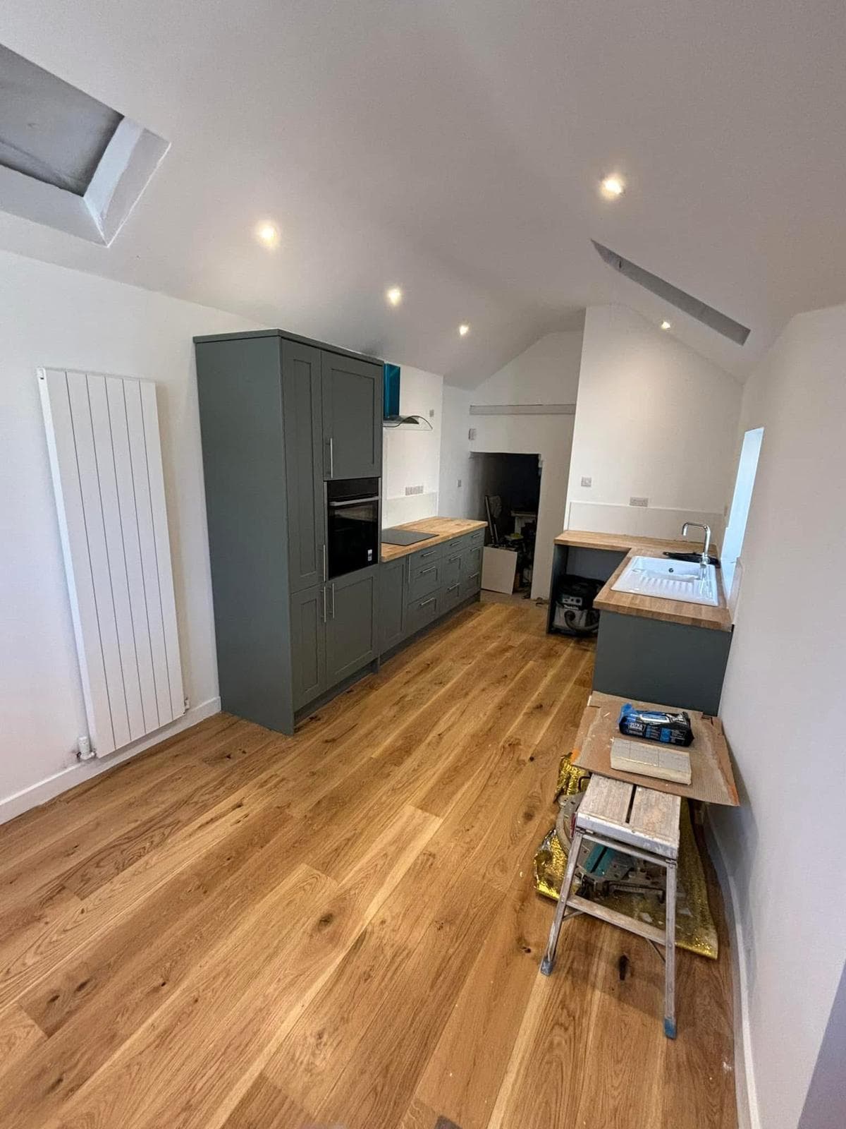 Completed open-plan kitchen renovation by ATC Building Services